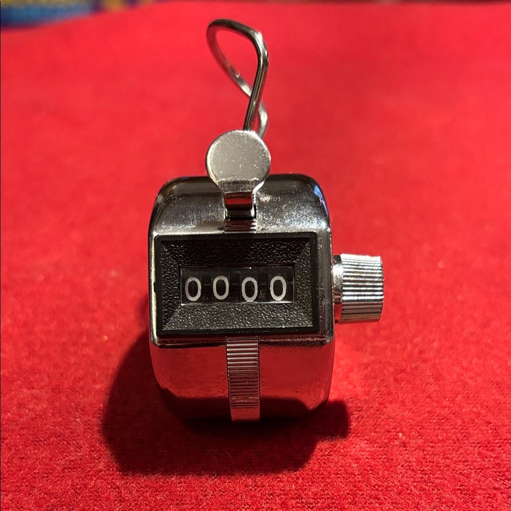 Compact Silver Handheld Counter